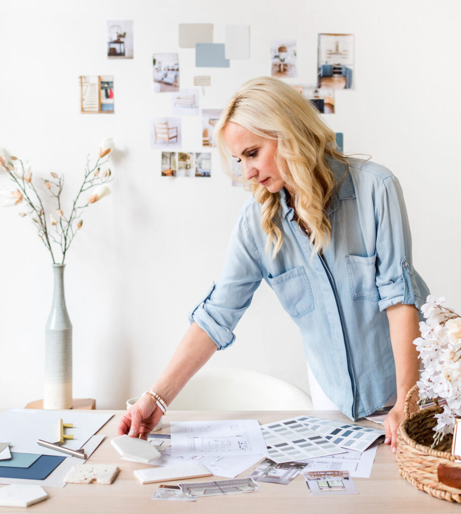 woman looking at paint colour swatches