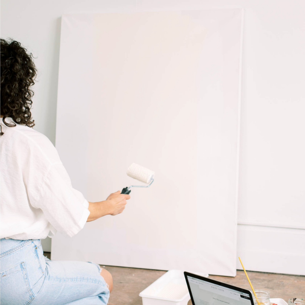 large paint sample board against plain white bristol board on the exterior of a home