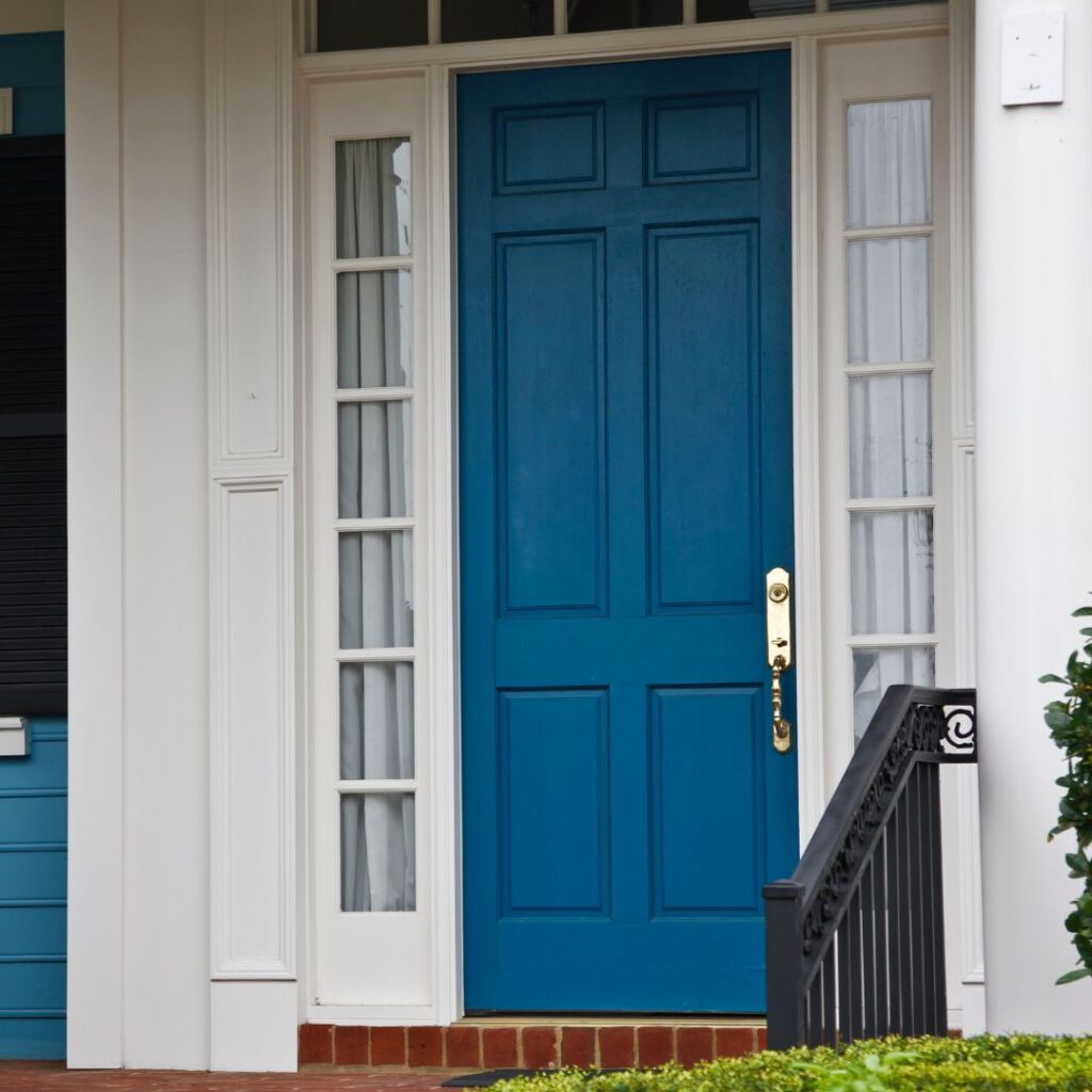 blue front door with white trim